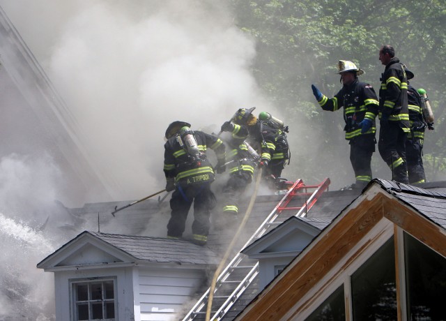 Firefihters venting the roof @ 77 Chestnut Ridge rd Photo courtesy Frank Becerra